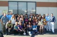 JA students and AT&T employees gather for a photo after a Job Shadow event.