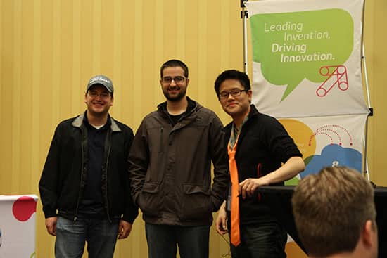 Alex Donn, mastermind behind AT&T Hackathons, congratulates the developers of Round Trip on their third place win. (photo courtesy of AT&T)