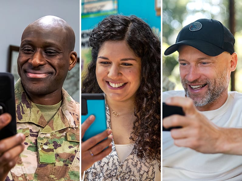 three people all looking at their phones