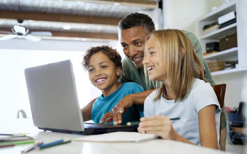 Children watching laptop